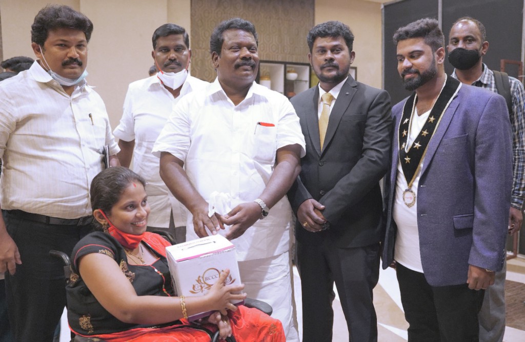 RAC Chennai Celebrities president Vinodh Chiranjeevi (R) at a fashion show for the differently-abled.