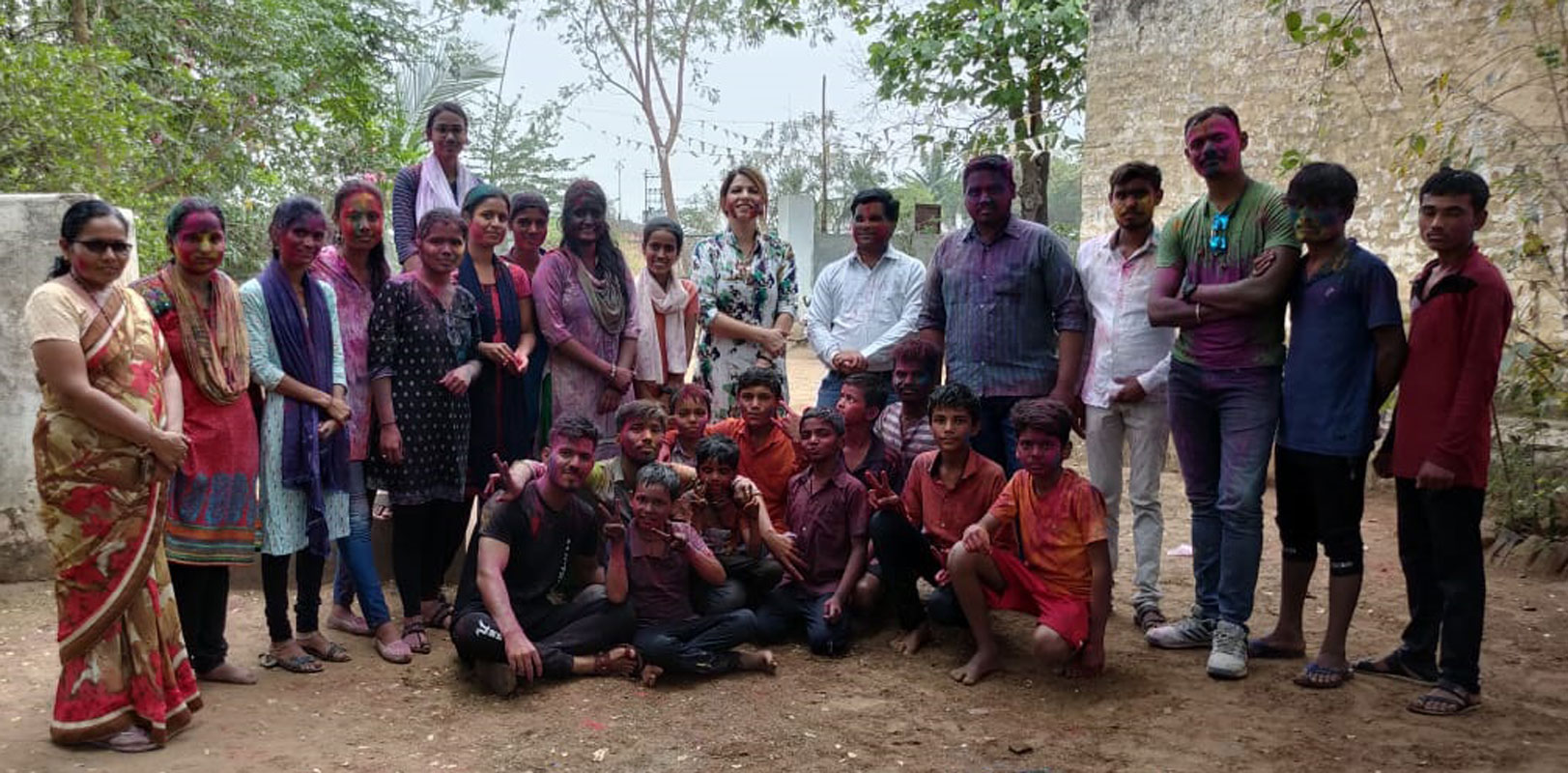 Rotaractors at the Prathana Balagram during Holi celebrations.