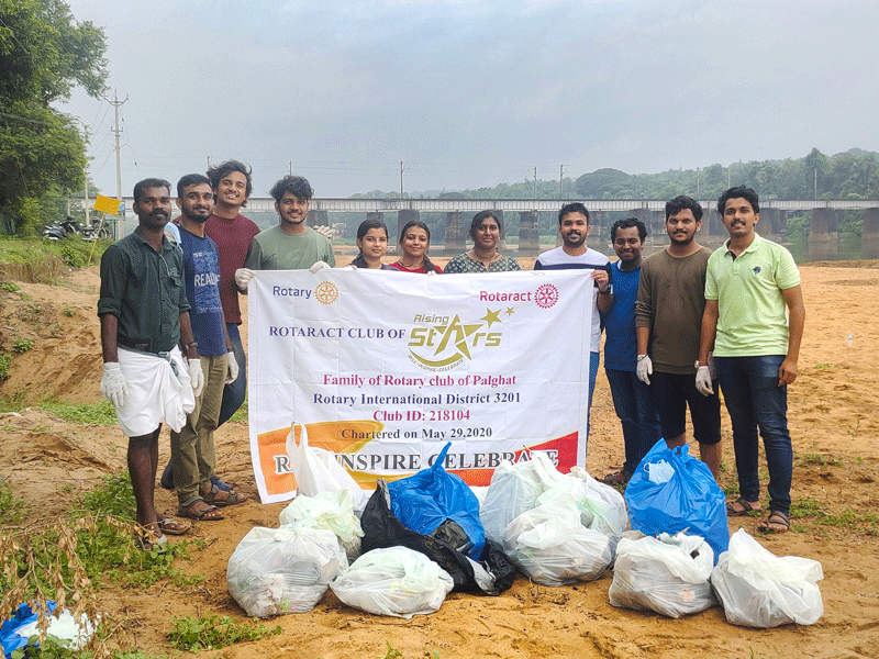Rotaractors with the garbage bags after cleaning the river Bharathapuzha.