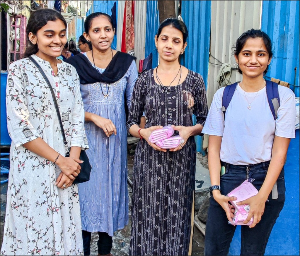 Rotaractors at a sanitary napkin distribution drive.