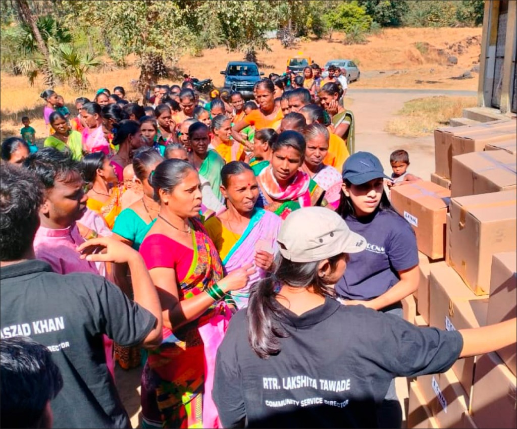 Packed food grains being donated to villagers under Project Handful of Grains.