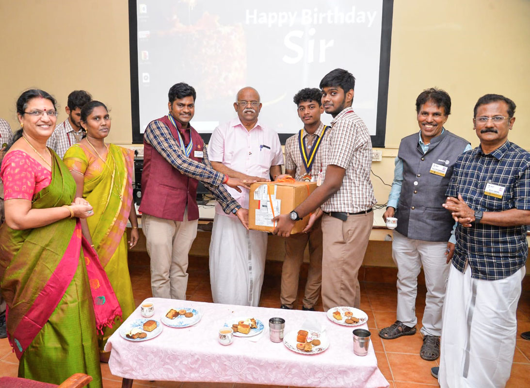 Interact club president Aashiv Muthusuthan gives dress material to RC SPIC Nagar president Arun Jeyakumar (3rd from L) in  the presence of DG V R Muthu (centre) and school principal  G Meenakumari (left) to be delivered to a special home.