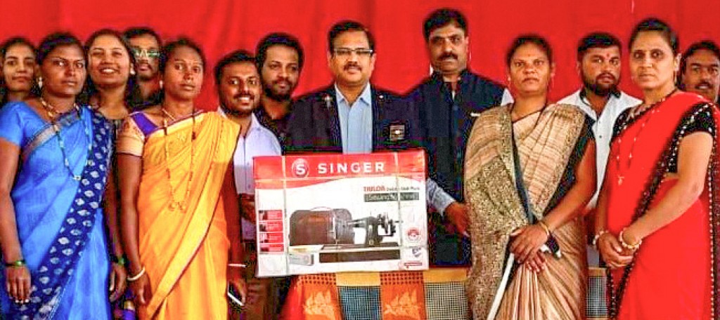 DG Anil Parmar (2022–23) at the distribution of sewing machines to rural women at Shel Pimpalgaon village. Also seen is DRR Akash Chikate.