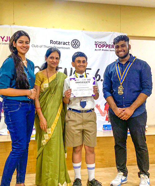 From L: Rtn Nisha Raju, judge Sangita Bhadane, student winner Rohil Tawade and club president Rushikesh Bhadane at Project Eloquence.