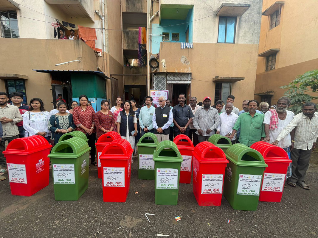 DG Venkatesh Deshpande, along with Rotaractors and Rotarians, after distributing dustbins at a slum colony.