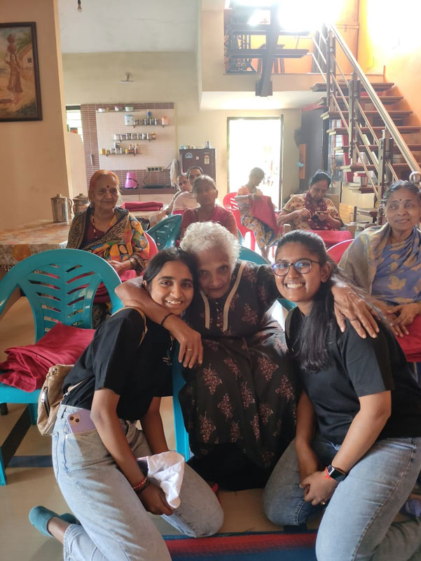 Rotaractors share a warm moment with the senior citizens at the Shantai Vrudashram.