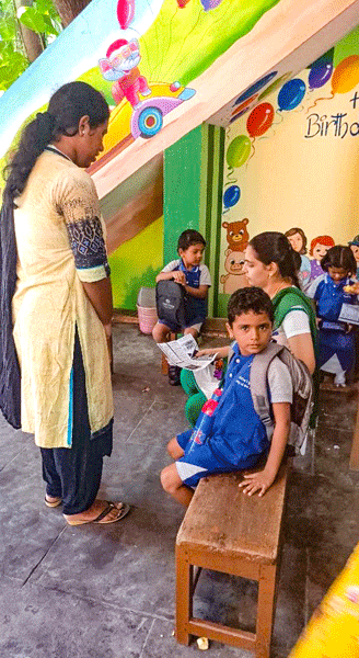 Pamphlets on the tenets of the Indian Constitution being ­distributed at a school.
