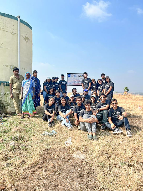 Team RAC H R College after installing a water tank in one of the club’s adopted villages.