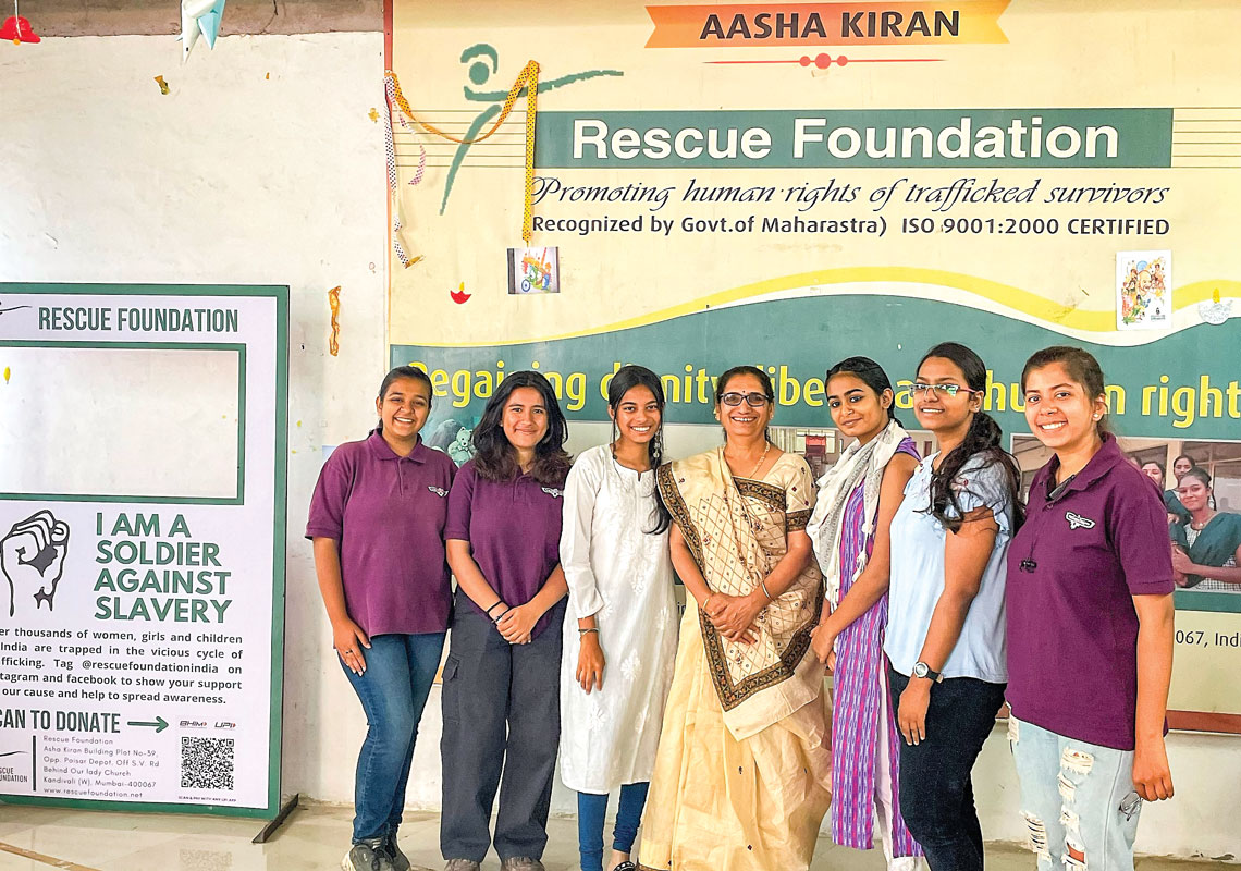 IPP of RAC Jai Hind College Khushi Shetty (third from L), former secretary Zainab Jetpurwala (L) and Team Cheekh with Triveni Acharya, founder of the Rescue Foundation.