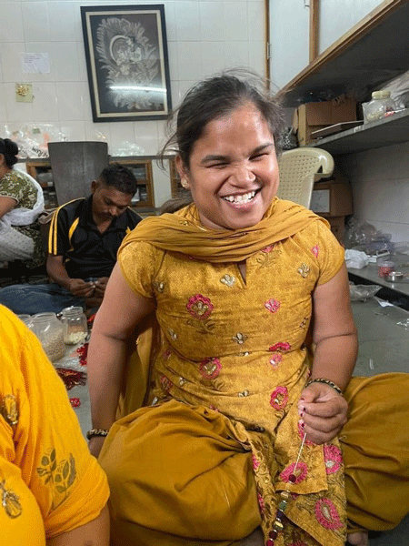 A raakhi being woven by a blind girl at the Andh Kanya Prakash Gruh.